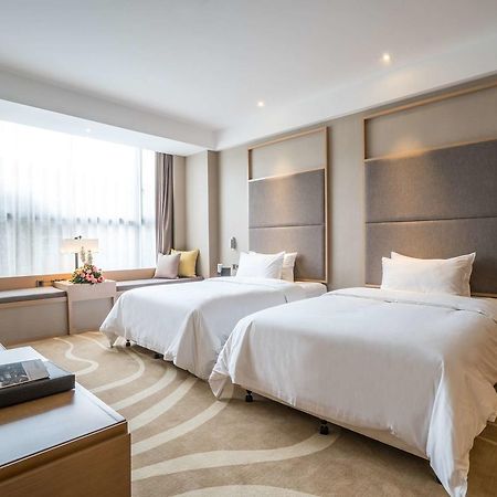 Ramada Encore Jintang Чэнду Экстерьер фото